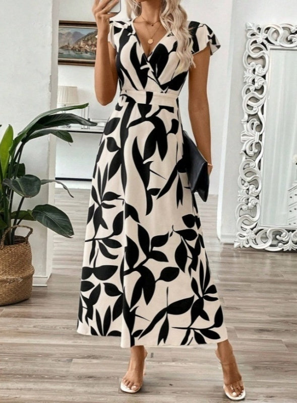 Elegancka sukienka maxi z nadrukiem i dekoltem w serek od Lidia Sek