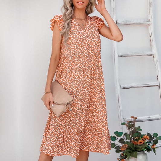 Elegancka sukienka midi z kwiatowym wzorem od Lidia Sek