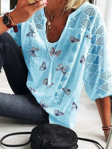 Bluzka Lidia Sek z dekoltem w serek i nadrukiem w motyle w stylu boho