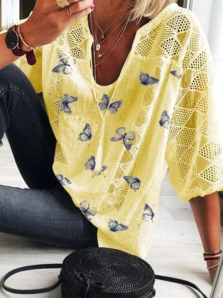 Bluzka Lidia Sek z dekoltem w serek i nadrukiem w motyle w stylu boho