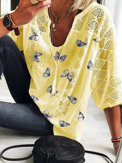 Bluzka Lidia Sek z dekoltem w serek i nadrukiem w motyle w stylu boho