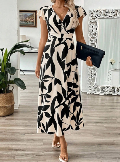 Elegancka sukienka maxi z nadrukiem i dekoltem w serek od Lidia Sek