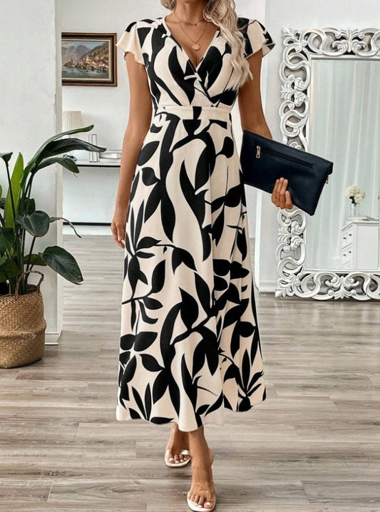 Elegancka sukienka maxi z nadrukiem i dekoltem w serek od Lidia Sek