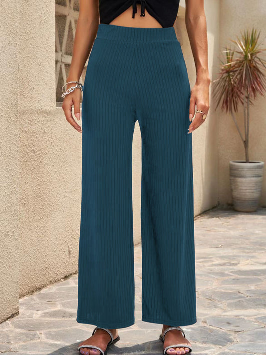 Elastyczne spodnie z szerokimi nogawkami marki Lidia Sek