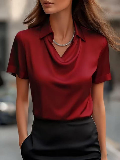 Elegancka satynowa bluzka z dekoltem w łódkę od Lidia Sek