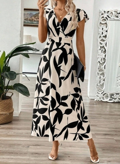 Elegancka sukienka maxi z nadrukiem i dekoltem w serek od Lidia Sek