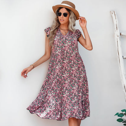 Elegancka sukienka midi z kwiatowym wzorem od Lidia Sek