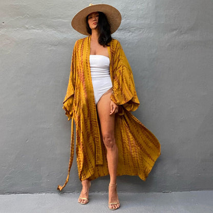 Elastyczny pokrowiec na bikini Lidia Sek z filtrem przeciwsłonecznym Vibrant Print